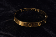 Classic Gold Screw-Detail Bangle