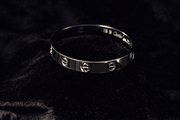 Sleek Silver Screw-Detail Bangle