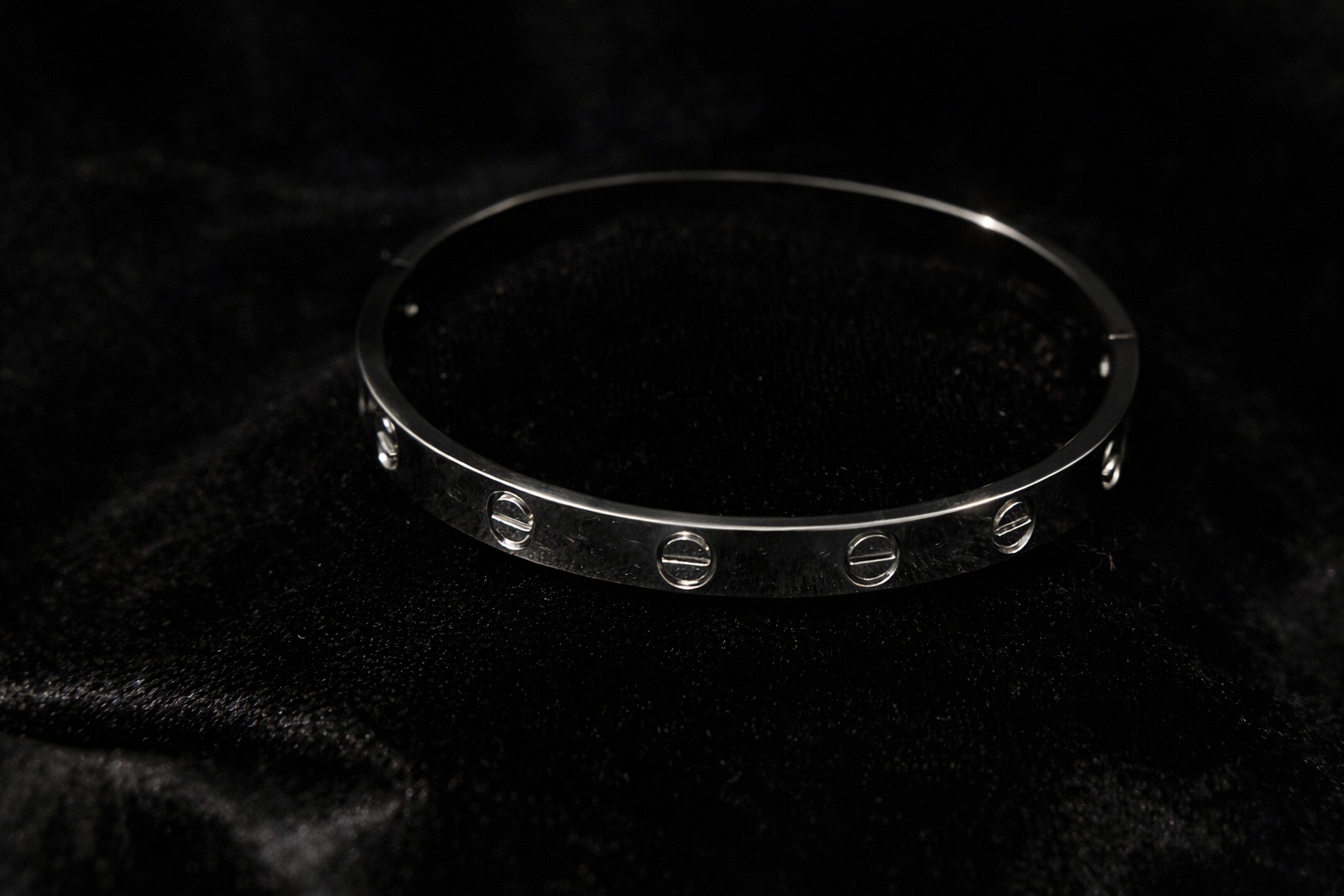 Sleek Silver Screw-Detail Bangle