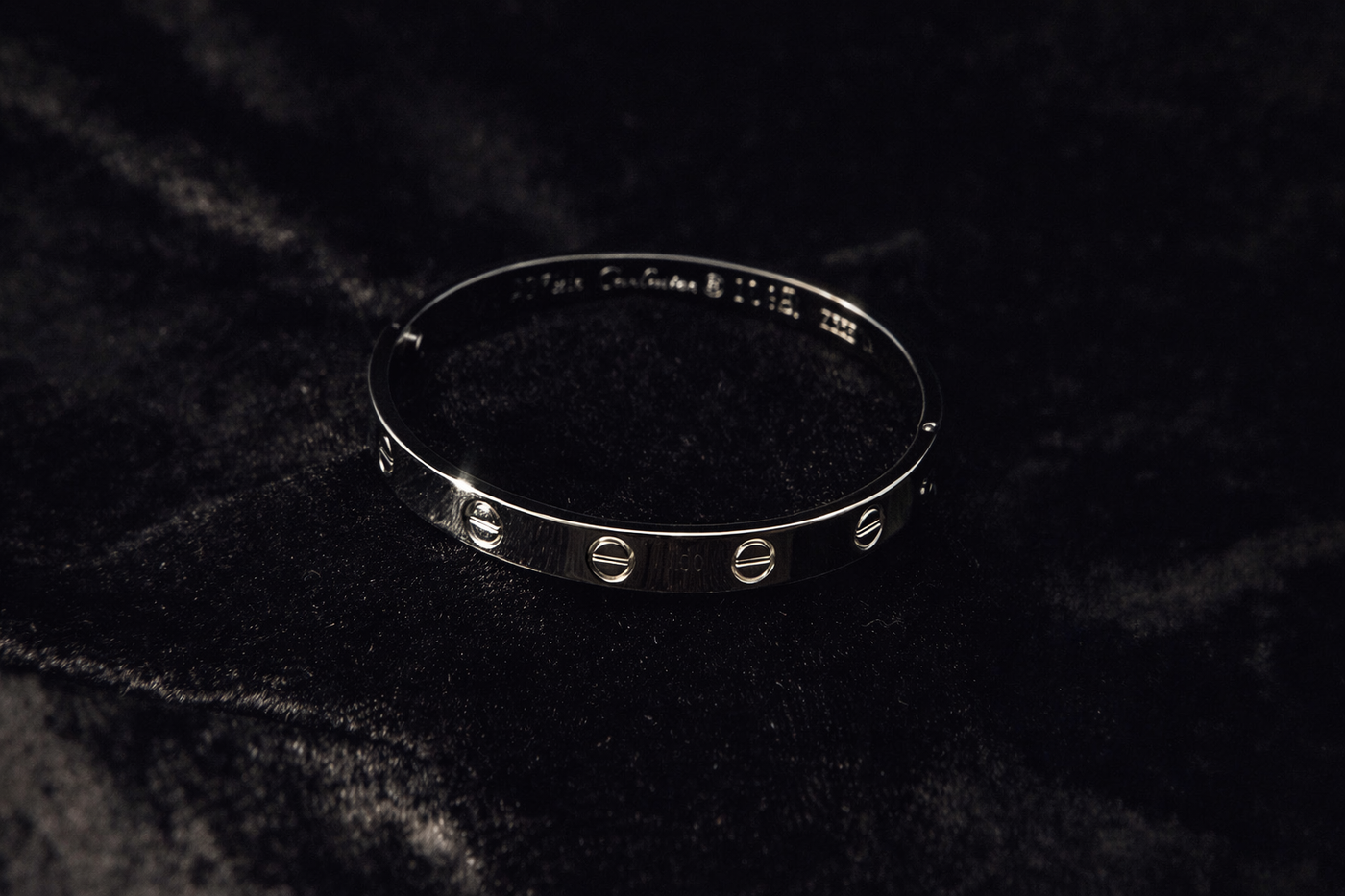 Sleek Silver Screw-Detail Bangle