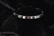Sleek Stainless Steel Screw-Detail Bangle