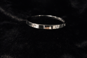 Sleek Stainless Steel Screw-Detail Bangle
