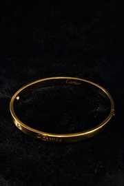 Gold Screw-Detail Bangle with Crystal Accent